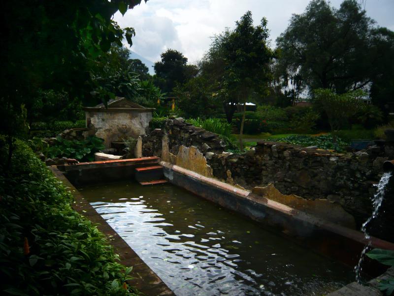 P1000689.JPG - Remnants of an old bath in the hotel gardens.