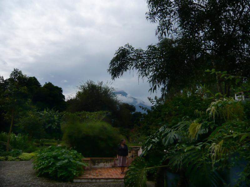 P1030001.JPG - Behind those clouds are beautiful, tall volcanoes- trust me, they are there.