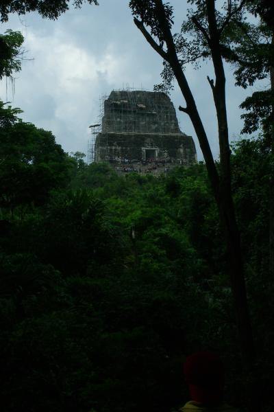 CIMG5112.JPG - The scale of this building can only be appreciated by looking at the people sitting on the lower section. This temple was undergoing restoration - hence all of the scaffolding.