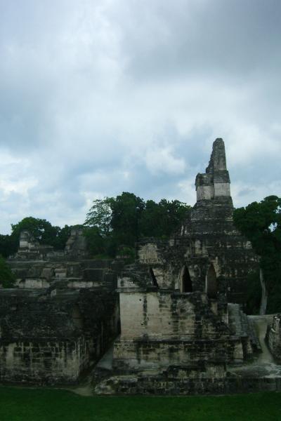 CIMG5106.JPG - When these building were constructed, they were covered with bright greeen and red stucco. Since the Mayans possessed no metal tools, had no beasts of burden, and did not use the wheel except in toys, it all the more impressive that they were able to build such elaborate structures.