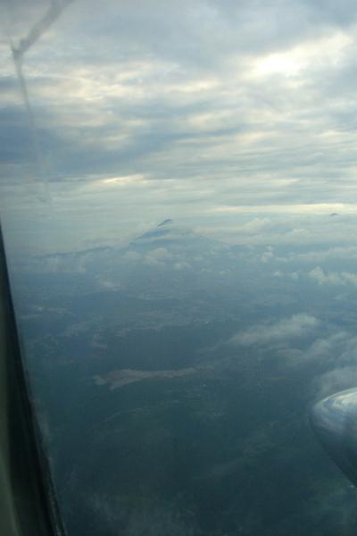 CIMG5133.JPG - These are pictures of one of the volcanoes taken from the little plane we took back from Tikal. All of our stay in Guatemala was cloudy owing to the time of year so we never got really clear pictures of the many volcanoes in the country.